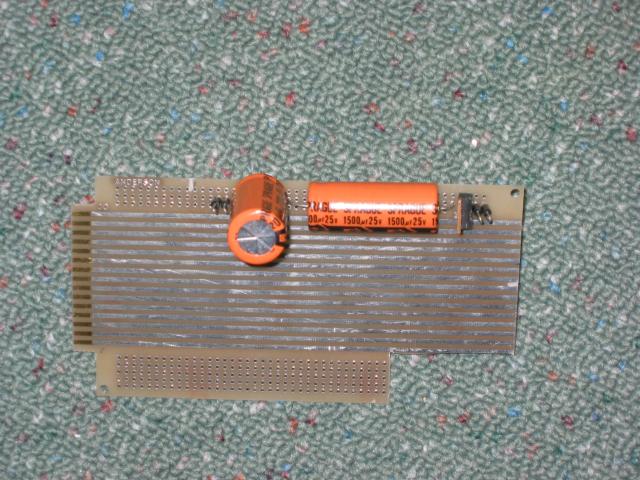 Small PCB containing the power supply